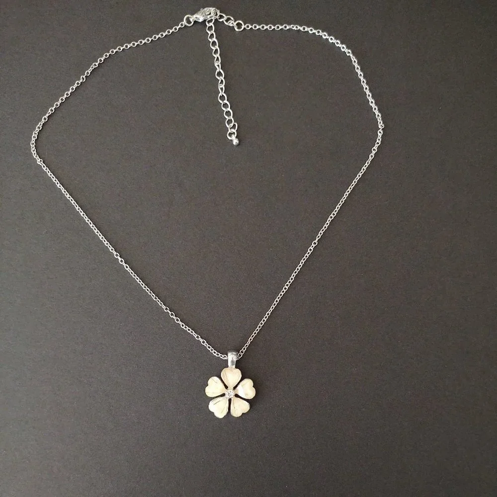 Cream flower pendant necklace with cz center and silver accents